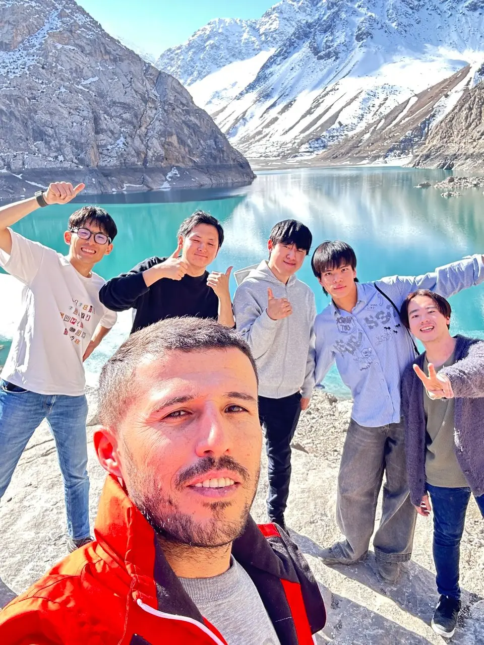Travelers near Seven Lakes in the Fann Mountains