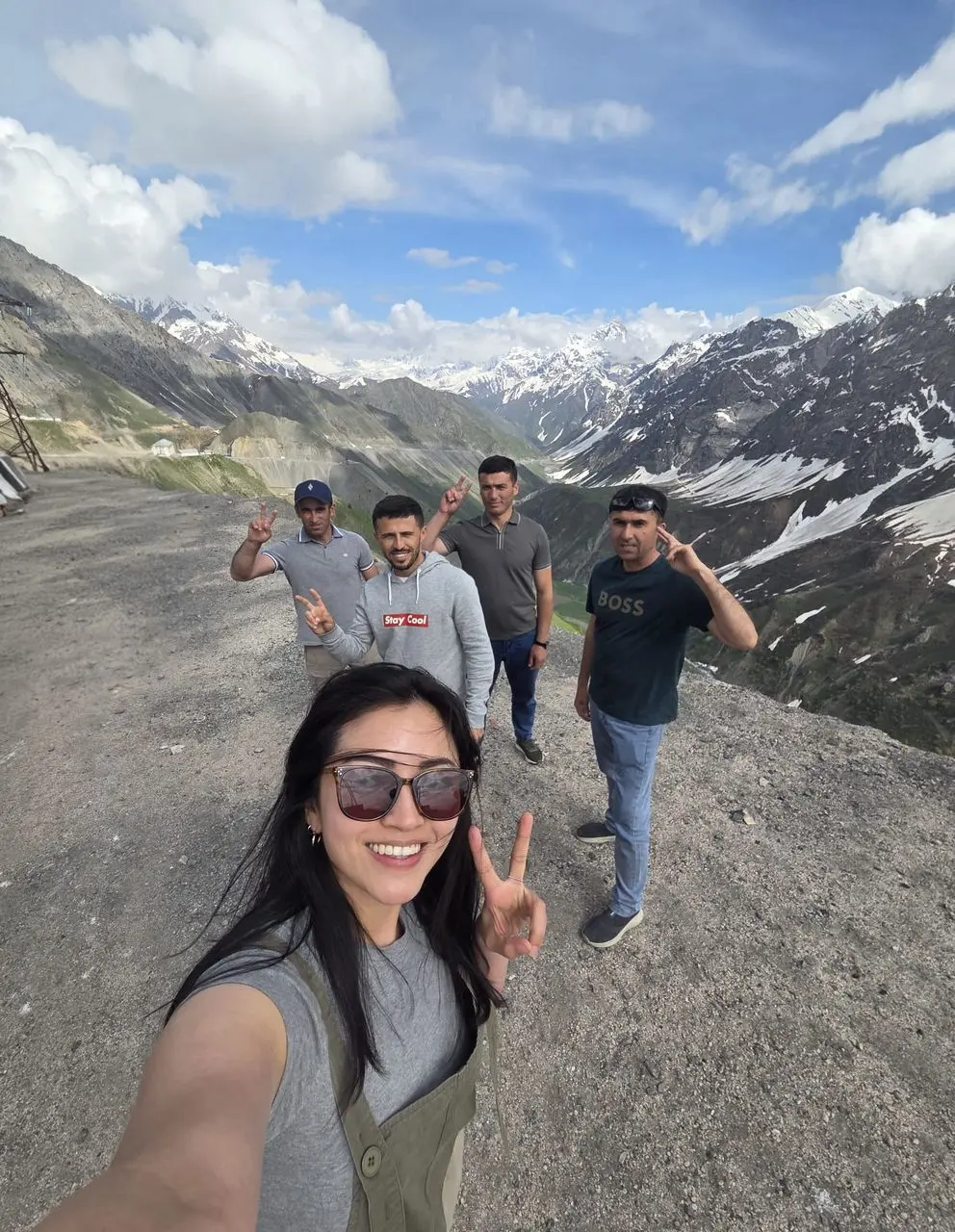 Travelers on the mountain road during a Seven Lakes tour