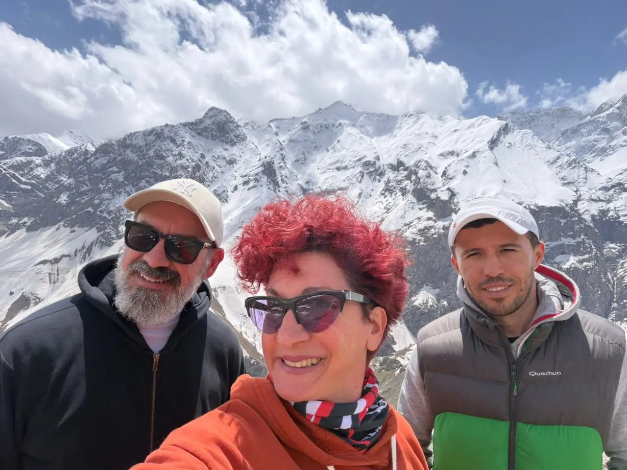 Tourists taking a photo in the Fann Mountains on the Seven Lakes route